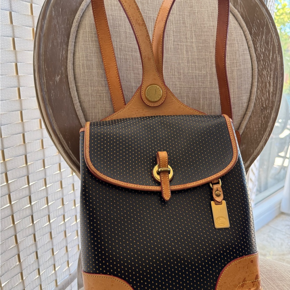 VINTAGE Dooney and Bourke Elegant Black and Brown Women’s Leather Backpack.